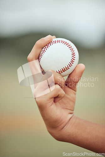 Image of Baseball, sports and sport exercise of a hand about to pitch and throw in pitch. Fitness man, training and baseball player workout of a athlete in outdoor holding a ball for a game or practice skill