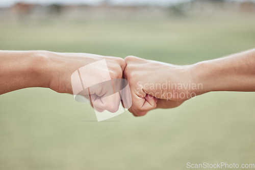 Image of Fist bump, hands and people together to show support, solidarity and achievement success outdoor. Friends hand gesture show community friendship, excited victory or goal collaboration in nature