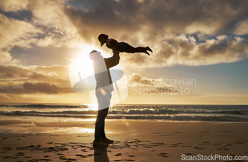 Image of Beach silhouette, father and child play, bond or enjoy fun quality time together in Rio de Janeiro brazil. Happy family love, sunset flare of freedom peace for dad and youth kid playing on ocean sand