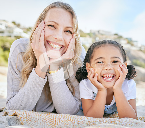 Image of Happy, mother and child on beach for relax, summer vacation and family bonding at the beach outdoors. Portrait of mama and kid with smile in happiness for break, adoption and free time on sandy shore