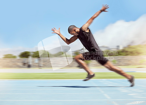 Image of Fitness, sports and runner running with speed, fast and with determination in training, exercise and cardio workout. Wellness, action and athlete sprinter sprinting in practice on race track in USA