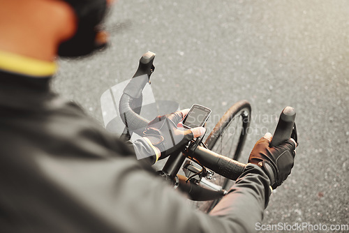 Image of Cycling, fitness and sport technology ride tracker of a cyclist on a bike after road training. Training, bicycle exercise time and bike workout of a person doing healthy cardio and sports health