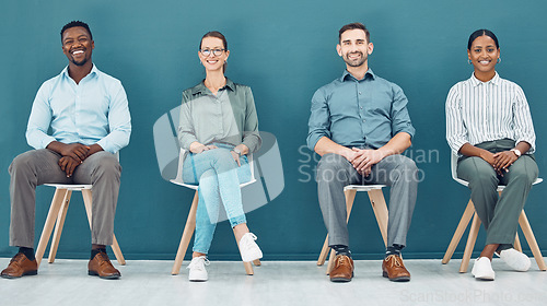 Image of Business people, chairs and row waiting for interview, meeting or opportunity sitting together at the office. Happy diverse group in wait room for line, hiring or recruitment process at the workplace