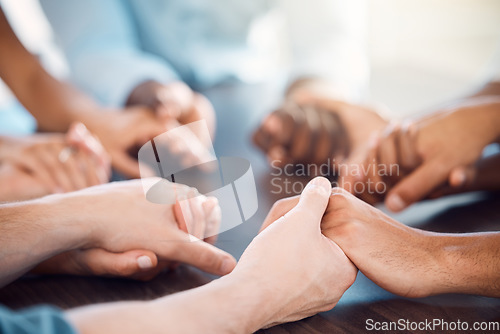 Image of Mental health support, holding hands and group counseling, therapy meeting and psychology help, trust and worship. Men, women and diversity people prayer circle, community hope and social solidarity