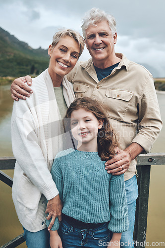 Image of Family, grandparents and child being happy, bonding and vacation with smile, holiday or together outdoor. Portrait, grandfather and grandmother with girl to relax, embrace and on road trip for travel