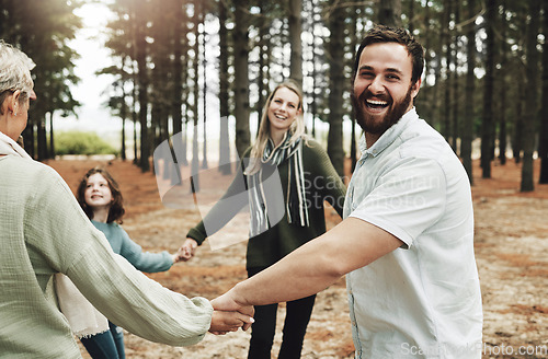 Image of Happy, mother and father playing in forest enjoying quality bonding time together holding hands in nature. Hand of mom, dad and child with grandparents in fun love, support and family care outdoors