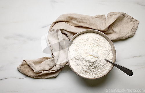 Image of bowl of flour and linen towel 