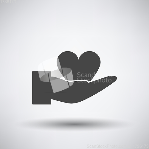 Image of Hand Present Heart Ring Icon