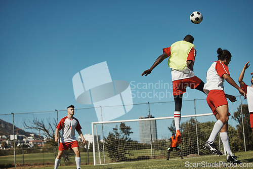 Image of Soccer, sports and training with a team on a field or grass pitch for a workout or exercise together. Football, fitness and teamwork with a soccer player group playing a game or match outdoor