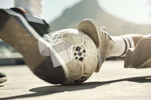 Image of Soccer ball, feet or tackle motion in fitness game, workout match or exercise competition challenge on Portugal city building rooftop. Zoom, sports men or football player shoes fighting to score goal