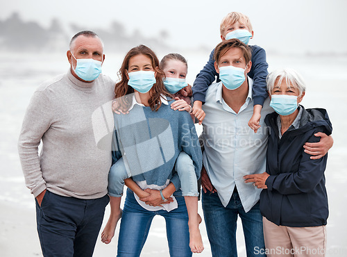 Image of Covid, family and ocean portrait with children in Germany with corona virus protection mask. Love, care and big family bonding at beach with coronavirus face mask for safety of grandparents.