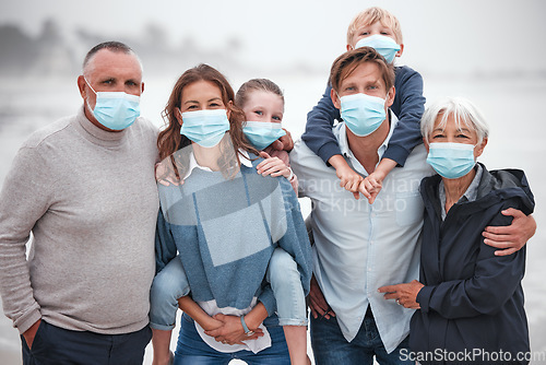 Image of Big family, covid and portrait with mask on holiday, vacation or trip outdoors. Health, safety and parents, grandparents and children relax, bonding and travel with face mask during covid 19 pandemic