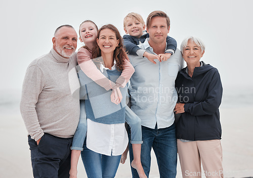 Image of Happy, smile and family with little kids, parents and grandparents together on beach. Happiness with children. bonding with mother, father, grandmother and grandfather outdoor on vacation or holiday