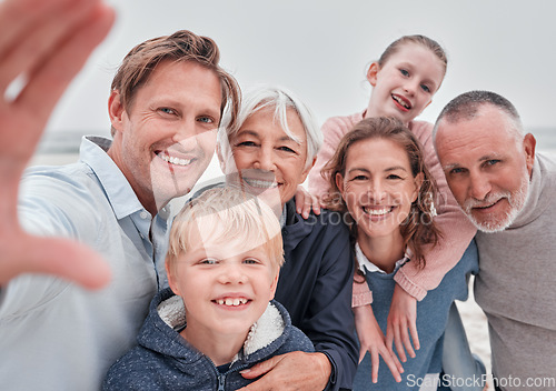 Image of Selfie, smile and portrait of happy family on the beach for winter fun, bond and enjoy quality time together. Love, nature and big family on Toronto Canada vacation for peace, freedom and wellness