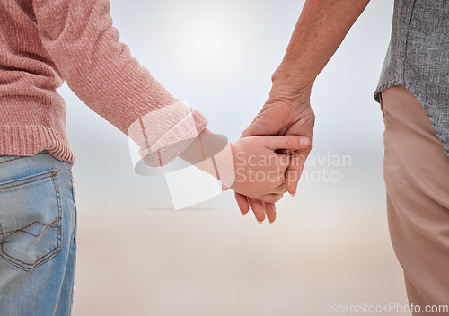 Image of Holding hands to show support, love and care outdoor to show trust and quality time together. Woman, man and couple with hand hold showing commitment, people solidarity and loving community help