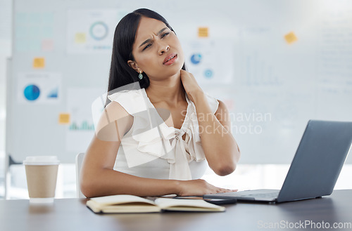 Image of Stress, burnout and neck pain with an asian business woman working on a laptop in her office for design. Problem, cramp and computer with a female designer at work online in a creative workplace