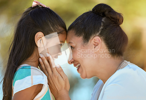 Image of Nature, love and happy grandma with child enjoying cute hand embrace on Indonesia summer holiday. Care, family and attachment of young kid bonding with grandmother touching her face in park.