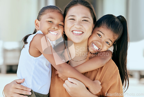 Image of Happy, portrait and children hugging their mother with a smile, love and care outside their house. Happiness, embrace and girl kids with their mom in Mexico sitting outdoor in their backyard at home.