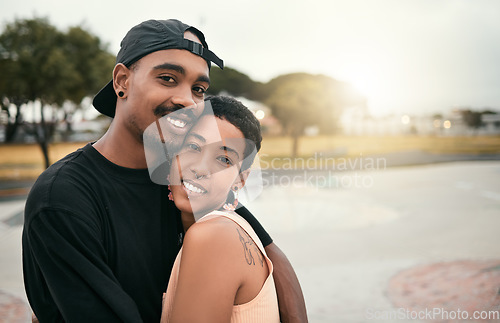 Image of Skate, love and portrait of black couple hug in city enjoying weekend, free time and summer. Skating, trendy fashion and young black man and woman in relationship, dating and embrace in skate park