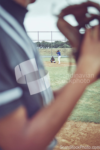 Image of Baseball, sports and fitness with a batter and pitcher on a grass pitch or field during a game or match. Exercising, training and workout with a baseball player playing in a competitive sport