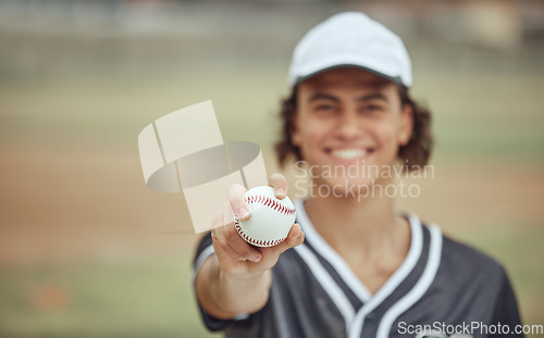 Image of Baseball player, hand and baseball for holding, outdoor or sport on field, happy or summer for fitness. Man, sports and ball for pitch, play or game in softball, contest or event has smile on grass