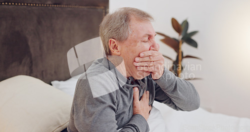 Image of Sick, cough and senior man in bed with allergies, flu or cold on a weekend morning at home. Illness, chest pain and elderly male person in retirement with asthma or infection in bedroom at house.