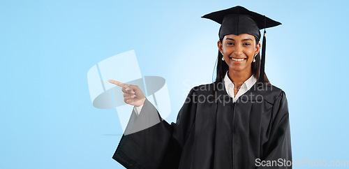 Image of Graduate, studio portrait or happy woman point at school registration, university ads or college information, choice or academy. Mockup space, education and graduation notification on blue background