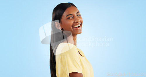 Image of Woman, happy and beauty portrait for student with confidence, gen z aesthetic and blue background. Indian person, face and smile in trendy fashion for cosmetics, make up and excited in studio mockup