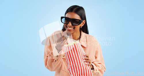 Image of Woman, comedy film and 3D glasses with popcorn, streaming and entertainment with vision on blue background. Cinema corn snack, funny movie with user experience, television and holographic in studio