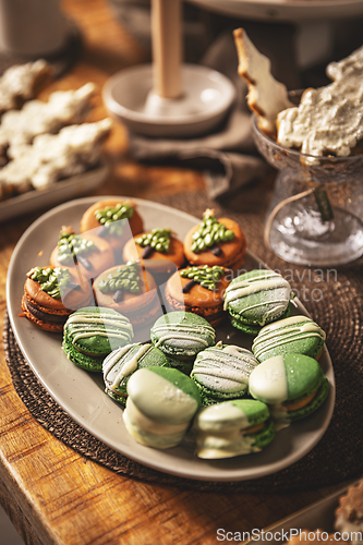 Image of Plate with beautifully decorated Christmas macarons