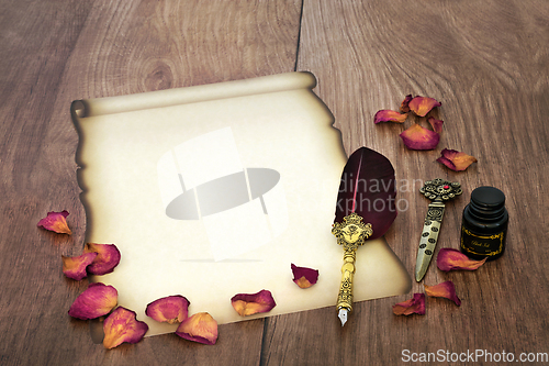 Image of Parchment Paper Scroll with Rose Petals for Valentines Love Lett