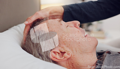 Image of Senior woman care for sick husband in bed with love, bonding and marriage at home together. Illness, recovery and elderly couple in retirement relaxing in bedroom of hospice, nursing center or house.