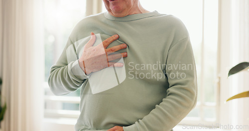 Image of Heart attack, cardiology and person holding chest with pain, sick and cardiovascular healthcare. Indigestion, heartburn and health with wellness, elderly care with medical issue and hypertension