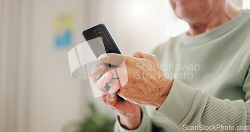 Image of Home, closeup and senior hands with a smartphone, typing and connection with social media, digital app and contact. Old man, pensioner or mature guy with a cellphone, mobile user and search internet