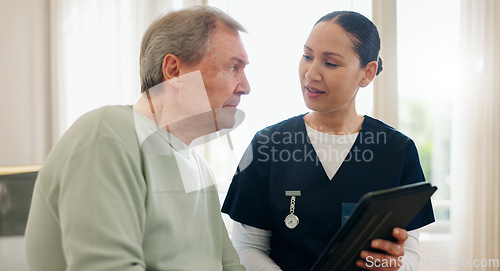 Image of Senior man, tablet and nurse consultation, healthcare and talking about health exam results, test feedback or assessment. Medical patient, nursing home and caregiver show report, diagnosis or info