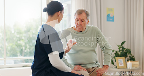 Image of Pills bottle, old man and caregiver explain product info, wellness medicine or healthcare prescription drugs. Sick patient, nursing home and nurse giving pharmaceutical vitamins for health recovery
