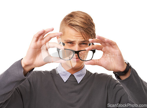 Image of Glasses, vision and portrait of man in a studio with confused, doubt or squinting facial expression. Optometry, health and young male person with spectacles or eyewear isolated by white background.