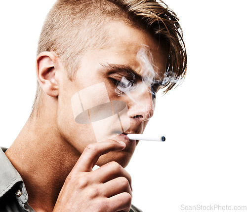 Image of Face, studio or man smoking a cigarette for stress, toxic addiction or unhealthy habit to relax. Dangerous, smoker or male person in Germany to inhale tobacco on white background or mockup space