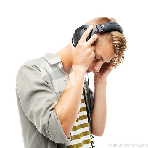 Image of Man, headphones and listening to music for podcast, audio streaming or DJ against a white studio background. Male person or sound artist with headset for beats, songs or playlist on mockup space