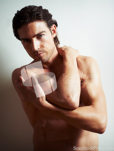Image of topless, relax or portrait of man in fitness bodybuilding workout, training or exercise in studio. Face of model, white background or handsome person with healthy body or muscle for wellness in Italy