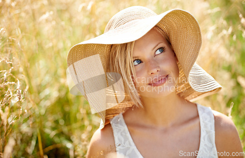 Image of Woman, thinking and hat in wheat field or sunshine summer relax, look on farm. Female person, idea and grass straw meadow nature for fresh clean air countryside or plants park, weekend rest or rural