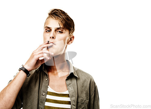 Image of Portrait, space or model smoking a cigarette for stress, toxic addiction or unhealthy habit to relax. Dangerous, smoker or cool man in Germany to inhale tobacco on white background or studio mockup