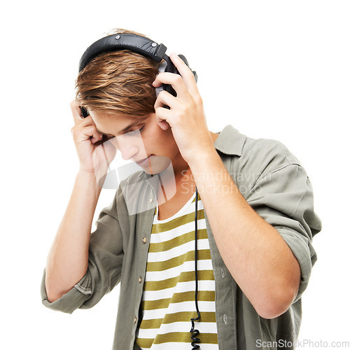 Image of Man, headset and listening to music for podcast, audio streaming or DJ against a white studio background. Male person or sound artist with headphones for beats, songs or playlist on mockup space