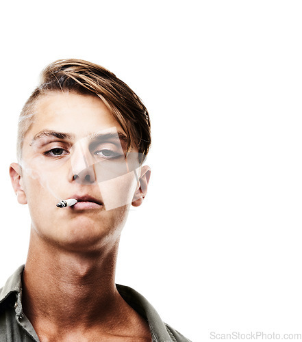 Image of Young man, portrait and face smoking cigarette isolated against a white studio background. Cool, attractive or handsome male person, model or smoker chilling or having a casual smoke on mockup space