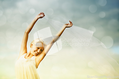 Image of Portrait, space and dance with a woman on bokeh for freedom, energy or to relax in the wind and fresh air. Sky, summer and a happy young person feeling carefree while moving in rhythm to music