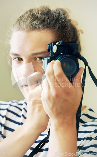 Image of Photography, portrait or man with camera isolated on white background for creative artist job or talent. Art, studio or face of gen z photographer with hobby or career taking picture for photoshoot