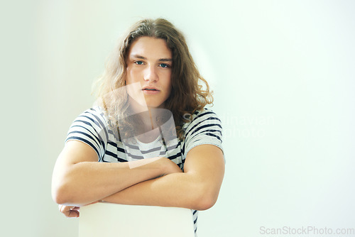 Image of Hair, salon and portrait of man in studio for beauty, cosmetics or dermatology in white background. Haircare, model and face of person with treatment for frizzy or messy hairstyle and skincare