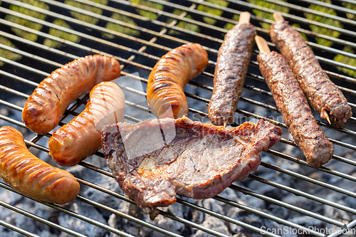 Image of various grilled meat and sausages