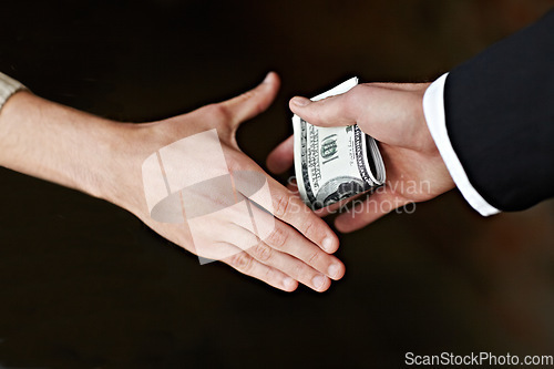 Image of Hands, bribe and cash for payment, deal with handshake, corruption and crime opportunity with dark background. People, businessman or corporate scam with money laundering and professional fraud