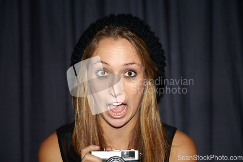 Image of Shock, photography and portrait of woman with camera for creative and art career by curtain. Surprise, scream and young female person from Australia with wow or omg face expression and dslr equipment